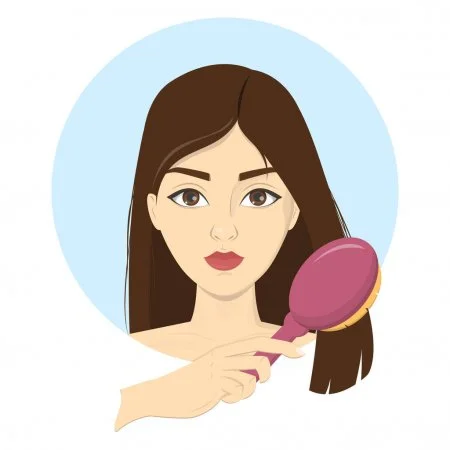woman-comb-her-hair-with