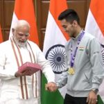pm modi with badminton player lakshya sen
